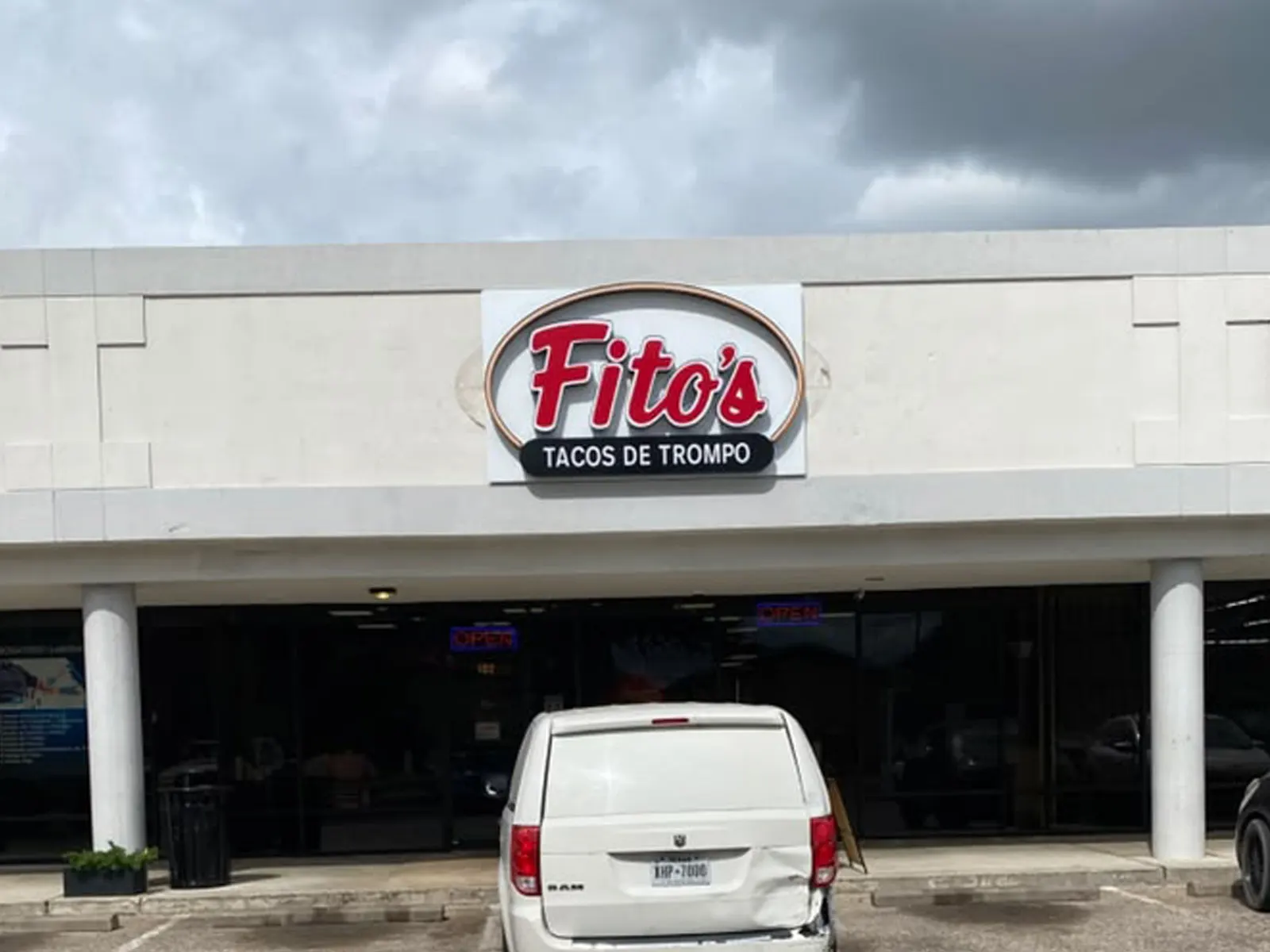 Fito's Tacos de Trompo oval logo sign on the fascia of a strip center restaurant