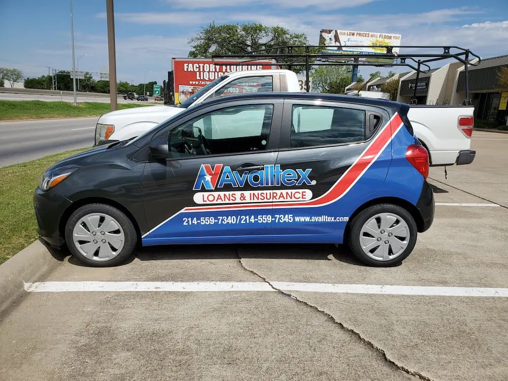 Avalitex Loans and Insurance compact car with red, white and blue wrap graphics